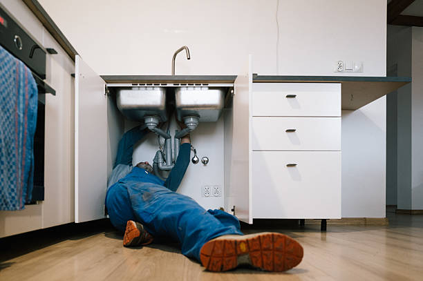 Professional Drain Cleaning technician working in Newark, MD